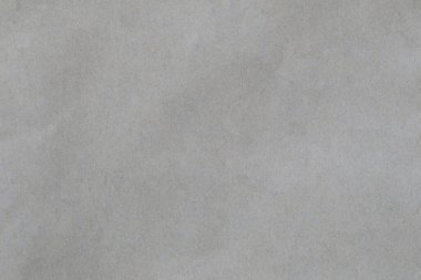 Çalışma arkaplanı konseptinde tasarım için pürüzsüz gri kağıt dokusu.