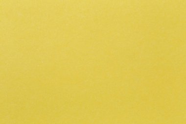 Çalışma arkaplanı konseptinde tasarım için sarı kağıt karton sanat arka planının dokusu.