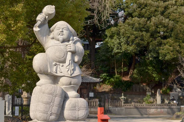 Grey stone statue in the park