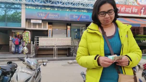 Woman Counting Money Yes Bank Background — Video
