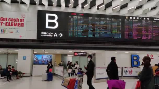 Pan Shot Masked People Waiting Departure Narita Airport — Vídeo de Stock