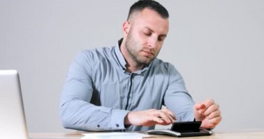 Accountant businessman filling tax form