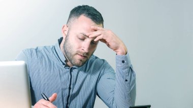 Businessman filling 1040 tax form