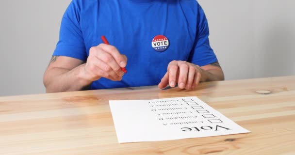 Voter marking his candidate — Stock Video