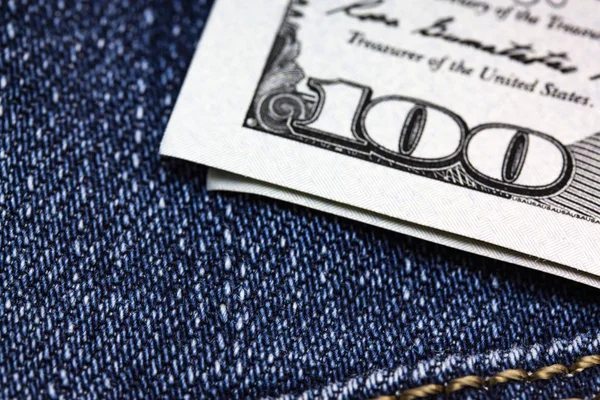Banknot studolarowy z przodu niebieskich dżinsów — Zdjęcie stockowe