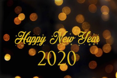 Mutlu yıllar 2020 Altın harflerle altın ışıklarla siyah bir arkaplanda