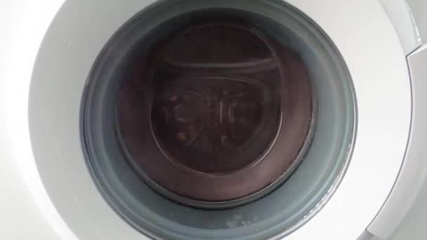 Washing Machine Spinning Clothes While Increasing Its Speed Progressively Reaching — Stock Video