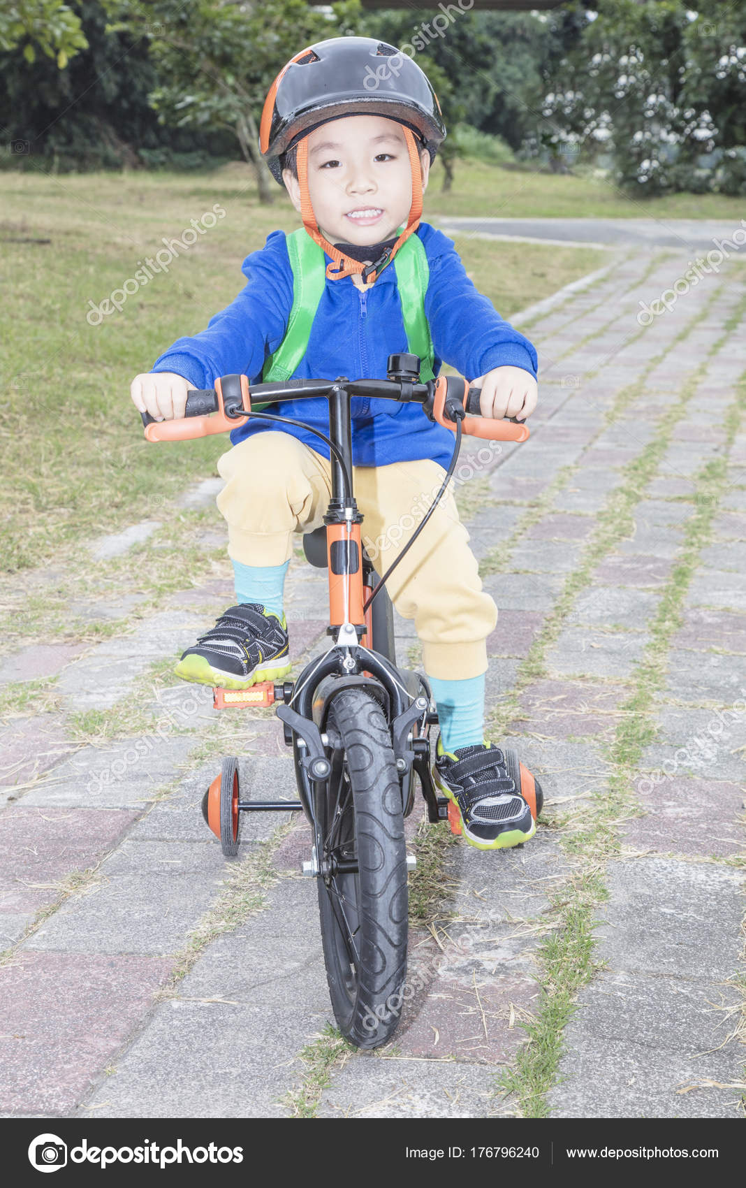 little boy on bike