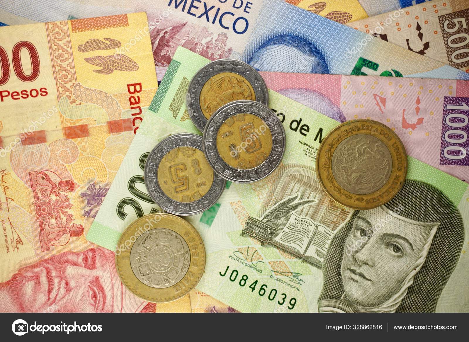Mexican pesos bills spread randomly over a flat surface — Stock Editorial  Photo © andresjabois #328862816