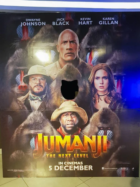 Jumanji: The Next Level movie poster, is a 2019 American fantasy adventure comedy film featuring Dwayne Johnson, Jack Black, Kevin Hart and Karen Gillan — Stock fotografie