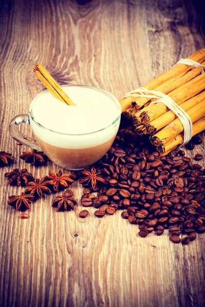 Cup of coffee on wooden background — Stock Photo, Image