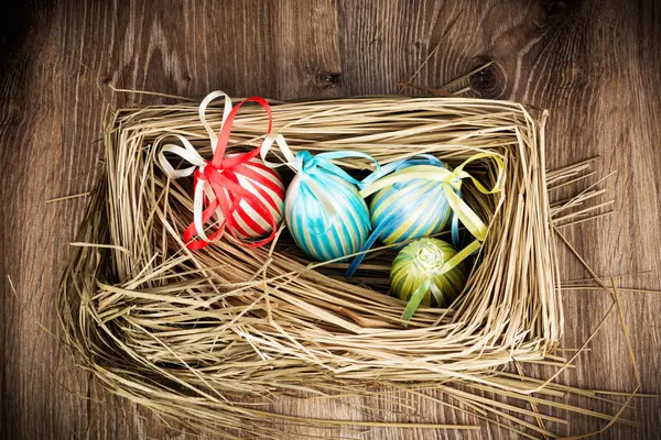 Easter eggs on wooden background — Stock Photo, Image