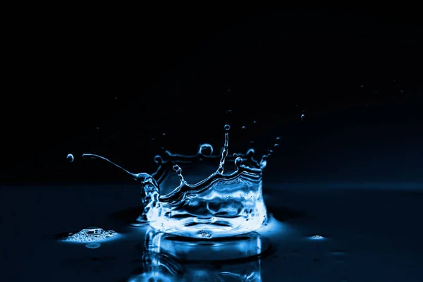 Photo of water splashes and ripples background — Stock Photo, Image