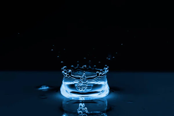 Photo of water splashes and ripples background — Stock Photo, Image