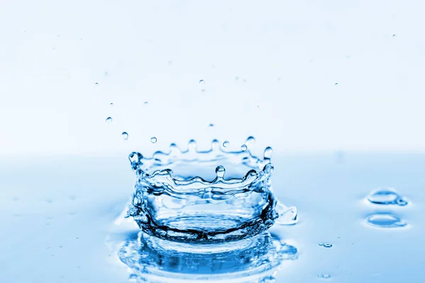 Photo of water splashes and ripples background — Stock Photo, Image