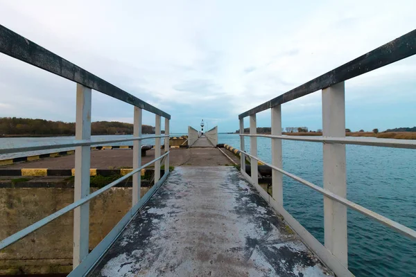 Bridge Leading Lighthouse — Stock Photo, Image