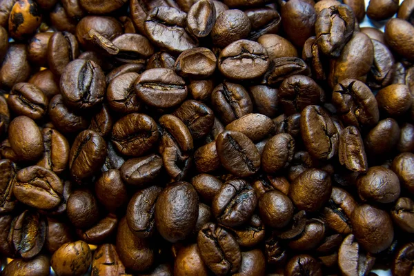 dark background of solid coffee beans