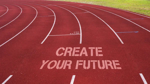 Citação motivacional escrita na faixa de corrida: Crie seu futuro — Fotografia de Stock