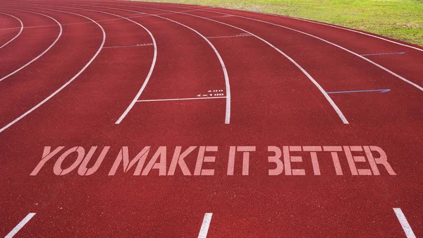 Cita motivacional escrita en pista de atletismo: You Make it Better —  Fotos de Stock