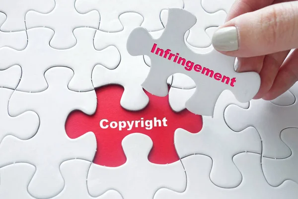 Puzzle with Copyright Infringement — Stock Photo, Image