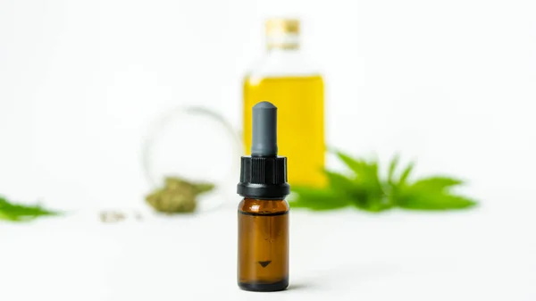 Glass Bottles Cbd Essential Oil Medical Marijuana Leaves Buds Seeds — Stock Photo, Image