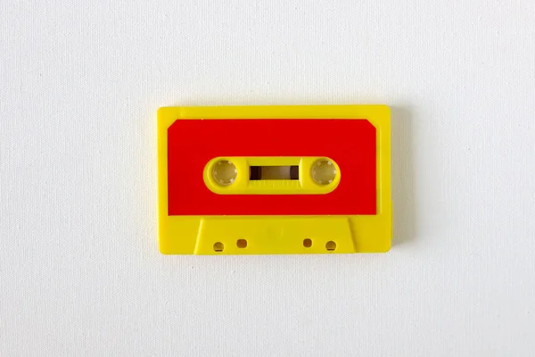 Old tape cassette, old or aged wood background. solated casette