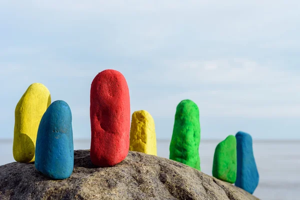 Painted stones on seashore — Stock Photo, Image