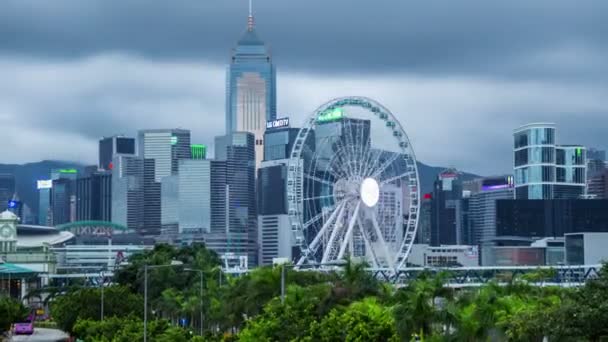 Ferris Wheel in Hong Kong, with landmark buildings. 4K TimeLapse - August 2016, Hong Kong — ストック動画
