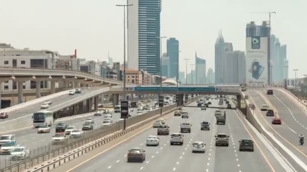 Nonstop traffic at Sheikh Zayed road, time lapse from above carriageway. Seven lane in each direction — Stock Video