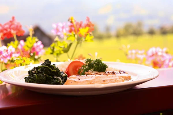 meat with toppings on plate in restaurant