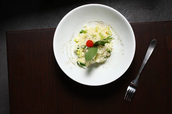 Asian rice food with plate and fork shot from above.