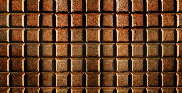 Background.Metal lid with squares on a road — 스톡 사진