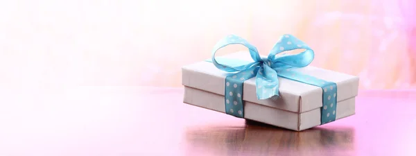 Christmas presents with copy space with a ribbon bow — Stock Photo, Image