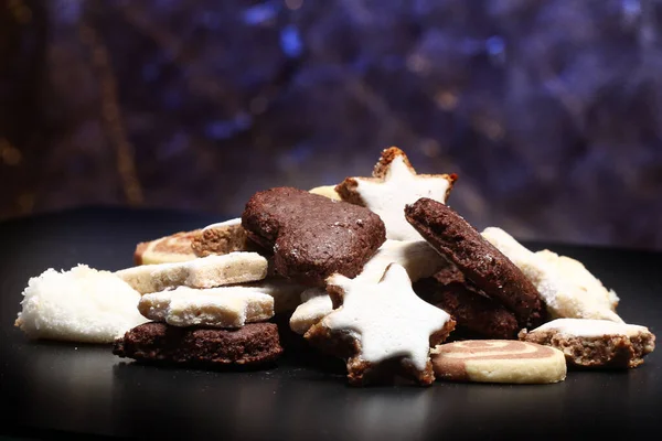 Christmas background with sweets - cookies and chocolate