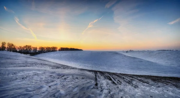 winter field. picturesque hilly field