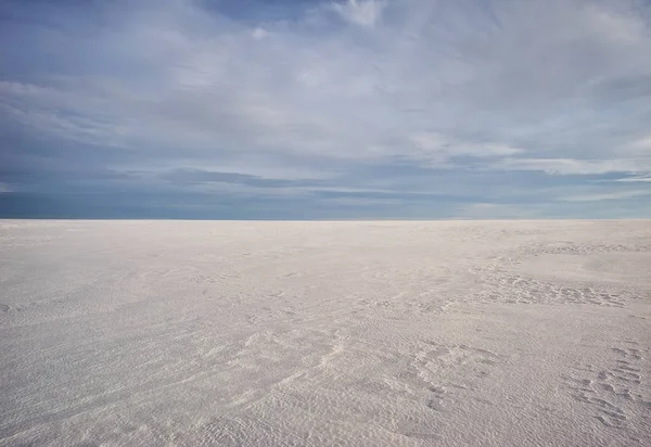 winter field. picturesque sunset in a snowy field