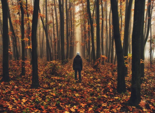 woman in the forest. man walks in a foggy forest. morning fog in a golden autumn forest