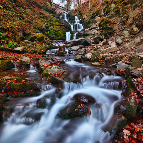 Shipot waterfall in the Carpathians. picturesque autumn waterfall