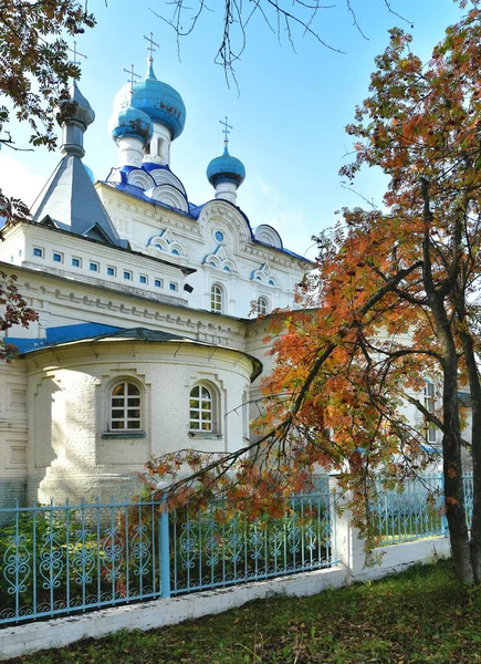 Orthodox Church, Church of the Intercession of the Holy Virgin in the Verkhnekamsk district in the autumn park