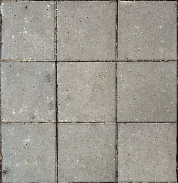 Gri asfalt döşeme dokusu, kirli kare duvar örtüsü.