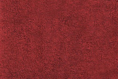 Bukleli kırmızı kumaş. Yumuşak tuval dokusu
