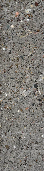 Stara betonowa powierzchnia ze śladami zniszczenia odsłoniętymi kamieniami przeplatanymi — Zdjęcie stockowe