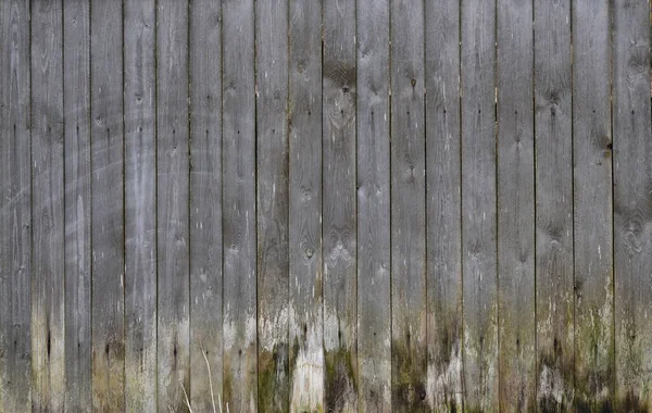 Tableros viejos, una pared pelada de madera de color marrón —  Fotos de Stock