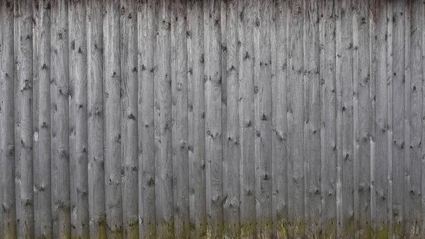 Tableros viejos, una pared pelada de madera de color marrón —  Fotos de Stock