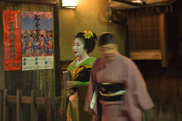 japanese woman in typical clothes walking in Gion district, Kyoto