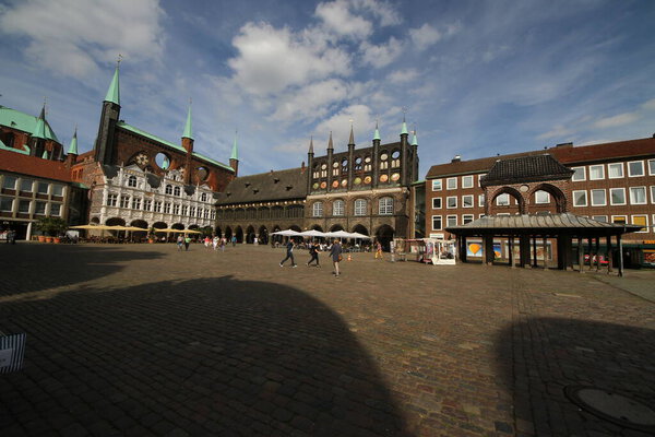 Tourist visit Market Square with City Administration building in Lubeck