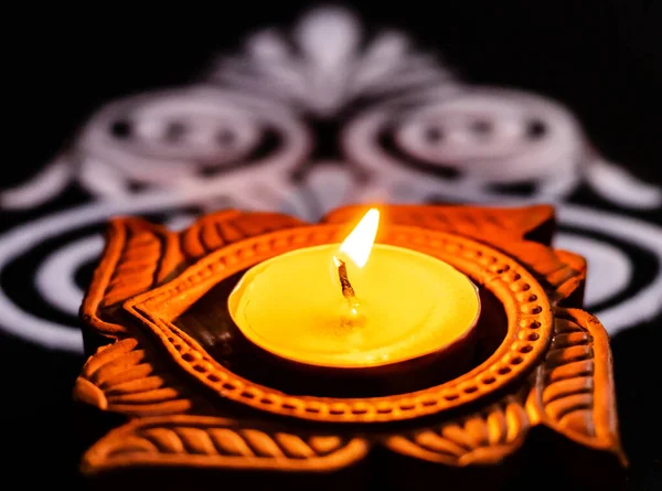 Marco Shot Beautiful Shining Terracotta Lamp White Rangoli Black Background — стоковое фото