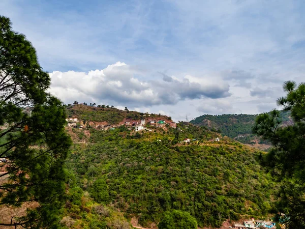 dramatic photography of hills and cloudy sky in the background, nature concept