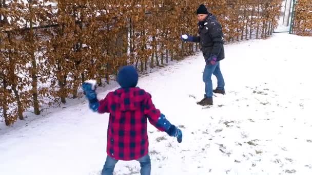 Boy Throwing Snowball His Dad Slow Motion — Stock Video