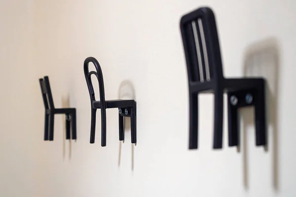 Clothes hanger chair on wall for decor